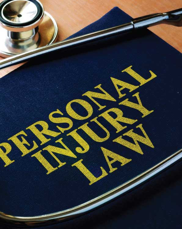Personal injury law book with stethoscope